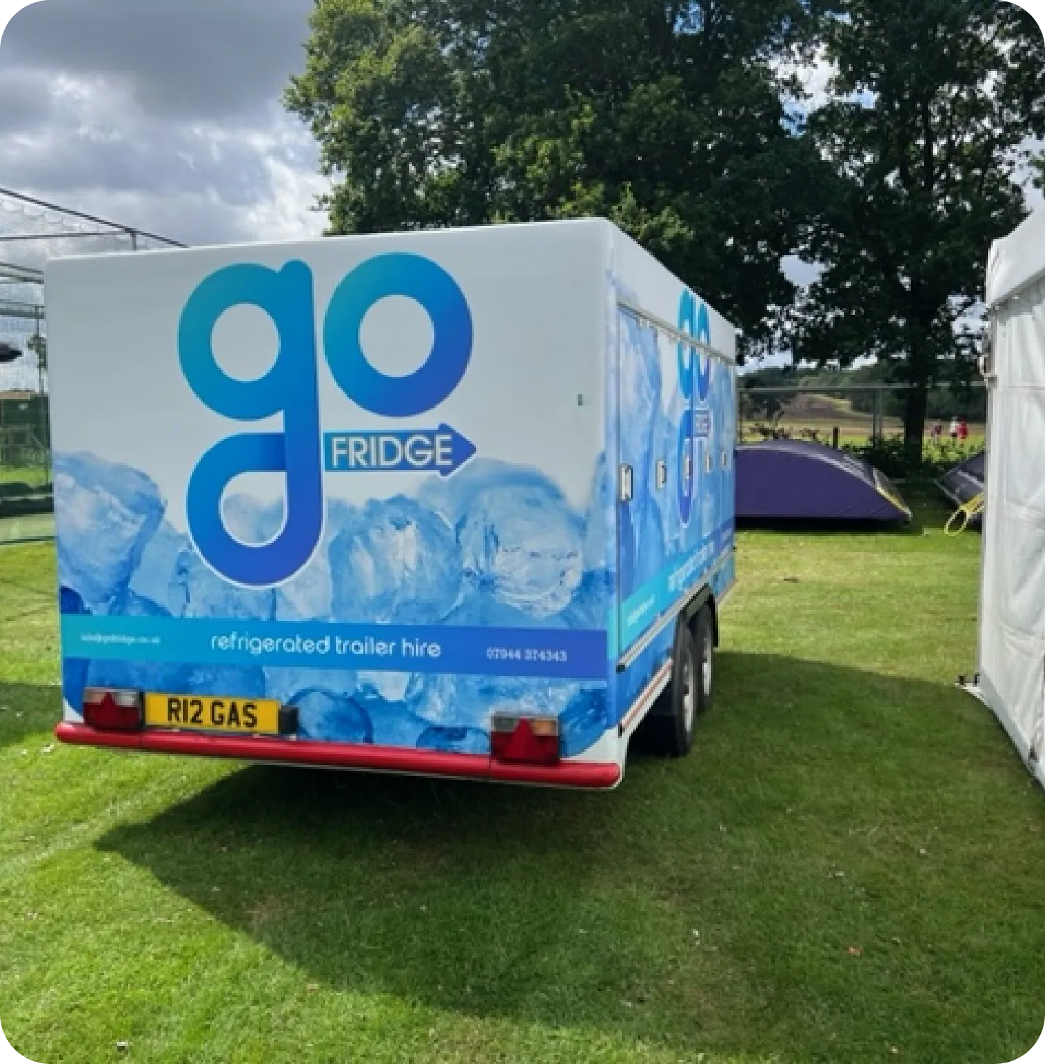 Rear view of a mobile refrigeration trailer for hire, showcasing secure access doors and a commercial refrigerated unit ideal for portable cold storage, catering, and event use.